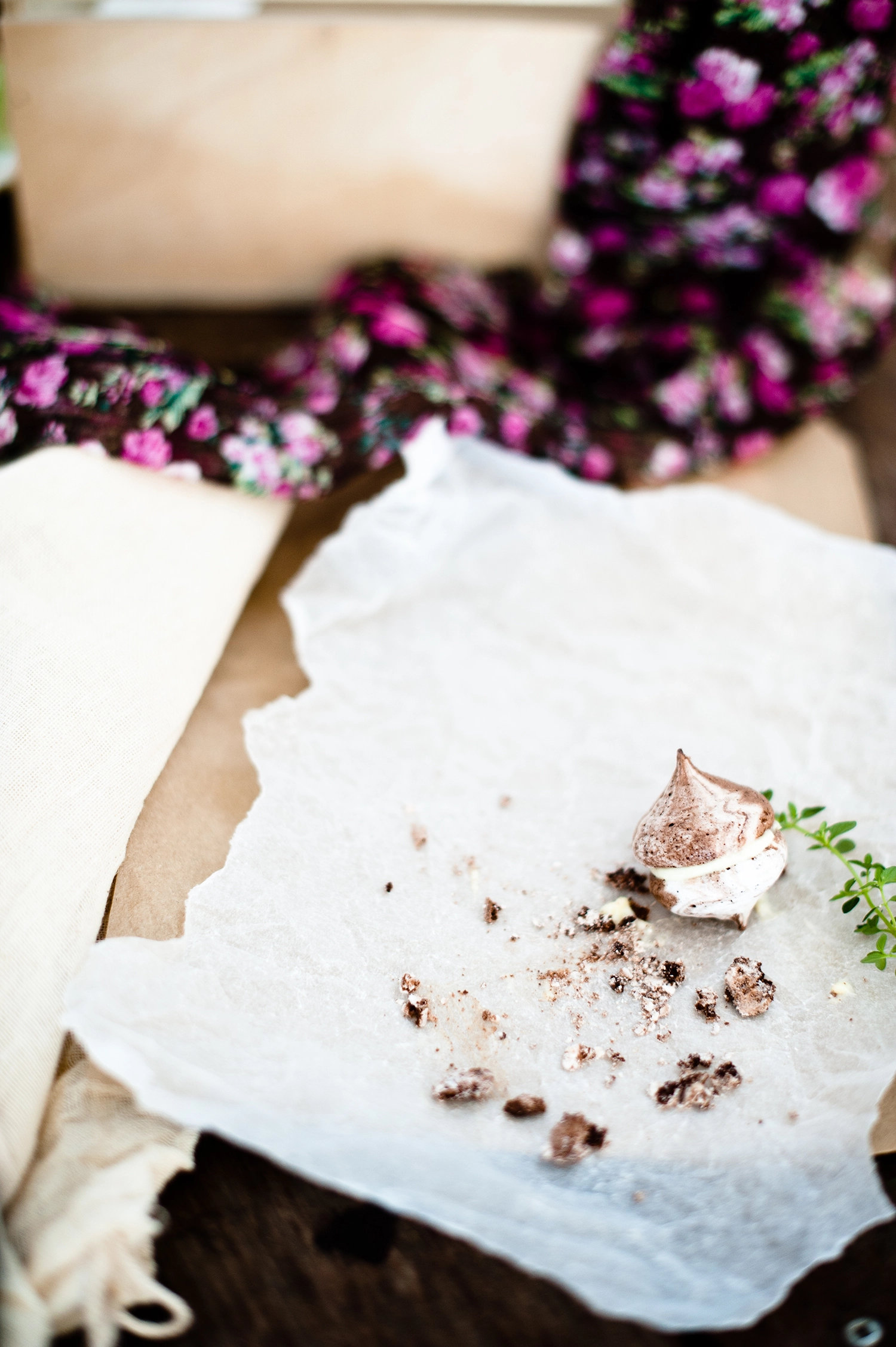 Mini Gluten free chocolate Meringue kisses stacked on partchment paper