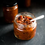 A beautifully balanced homemade Spiced Tomato and Cherry Chutney that’s sweet, tangy, and warmly spiced. Perfect with roast meats, cheese boards, or as a thoughtful edible gift. Gluten-free and simple to make from scratch.