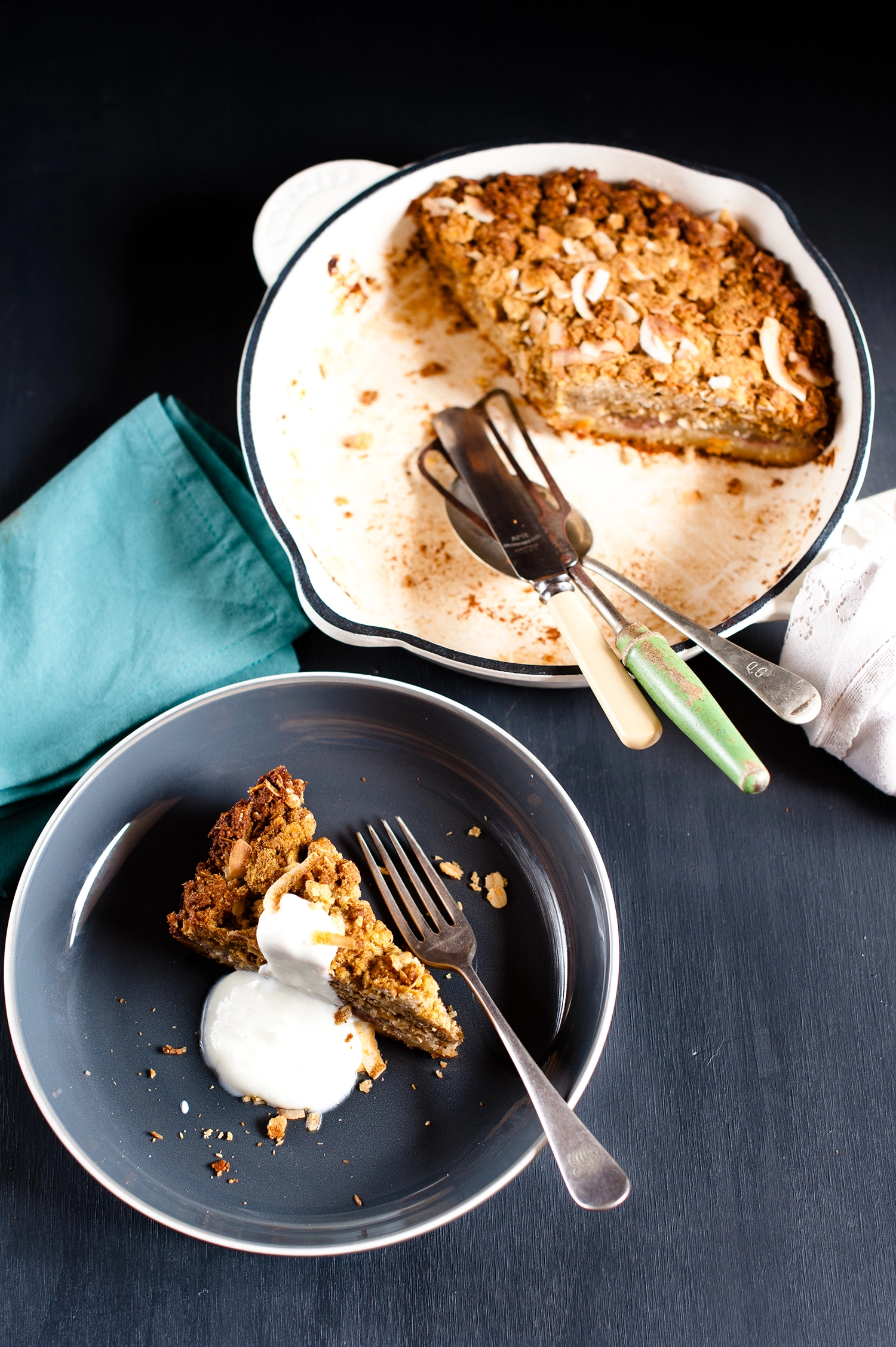 A rustic gluten free raspberry frangipane cake topped with soft apple compote and a golden ANZAC crumble made from oats, coconut and almonds; a rich, fruity almond cake with crisp, buttery edges.