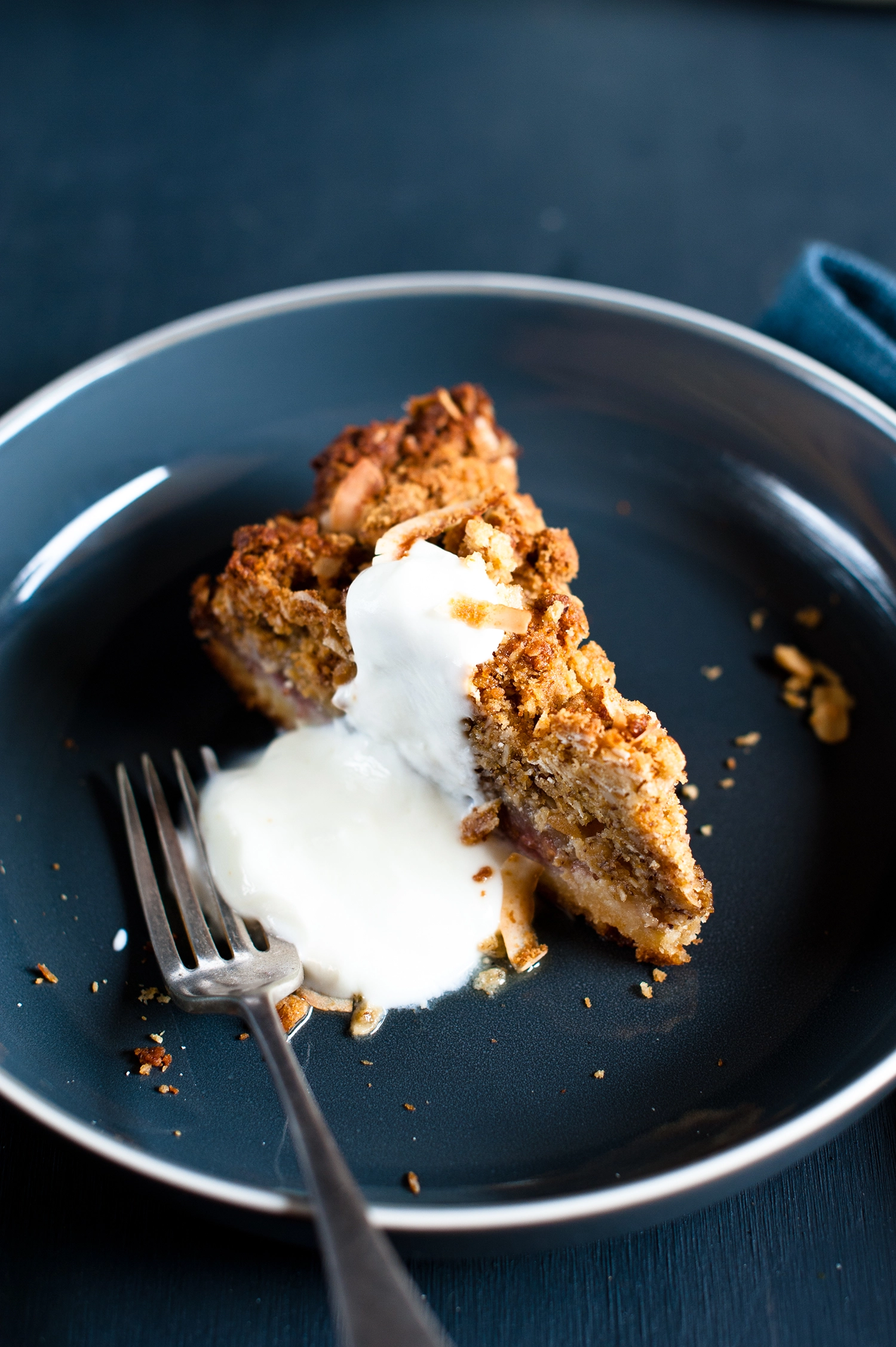 A rustic gluten free raspberry frangipane cake topped with soft apple compote and a golden ANZAC crumble made from oats, coconut and almonds; a rich, fruity almond cake with crisp, buttery edges.