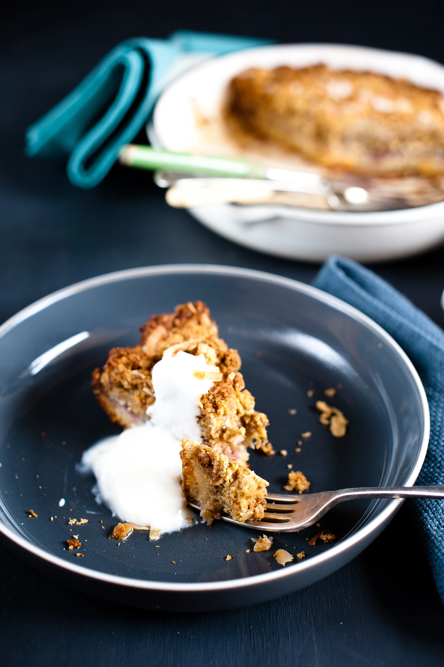 A rustic gluten free raspberry frangipane cake topped with soft apple compote and a golden ANZAC crumble made from oats, coconut and almonds; a rich, fruity almond cake with crisp, buttery edges.