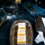 A bright, tart and comforting gluten-free Lemon Curd Slice with a buttery coconut base. Easy to make, perfect for winter or summer, and always a crowd-pleaser.