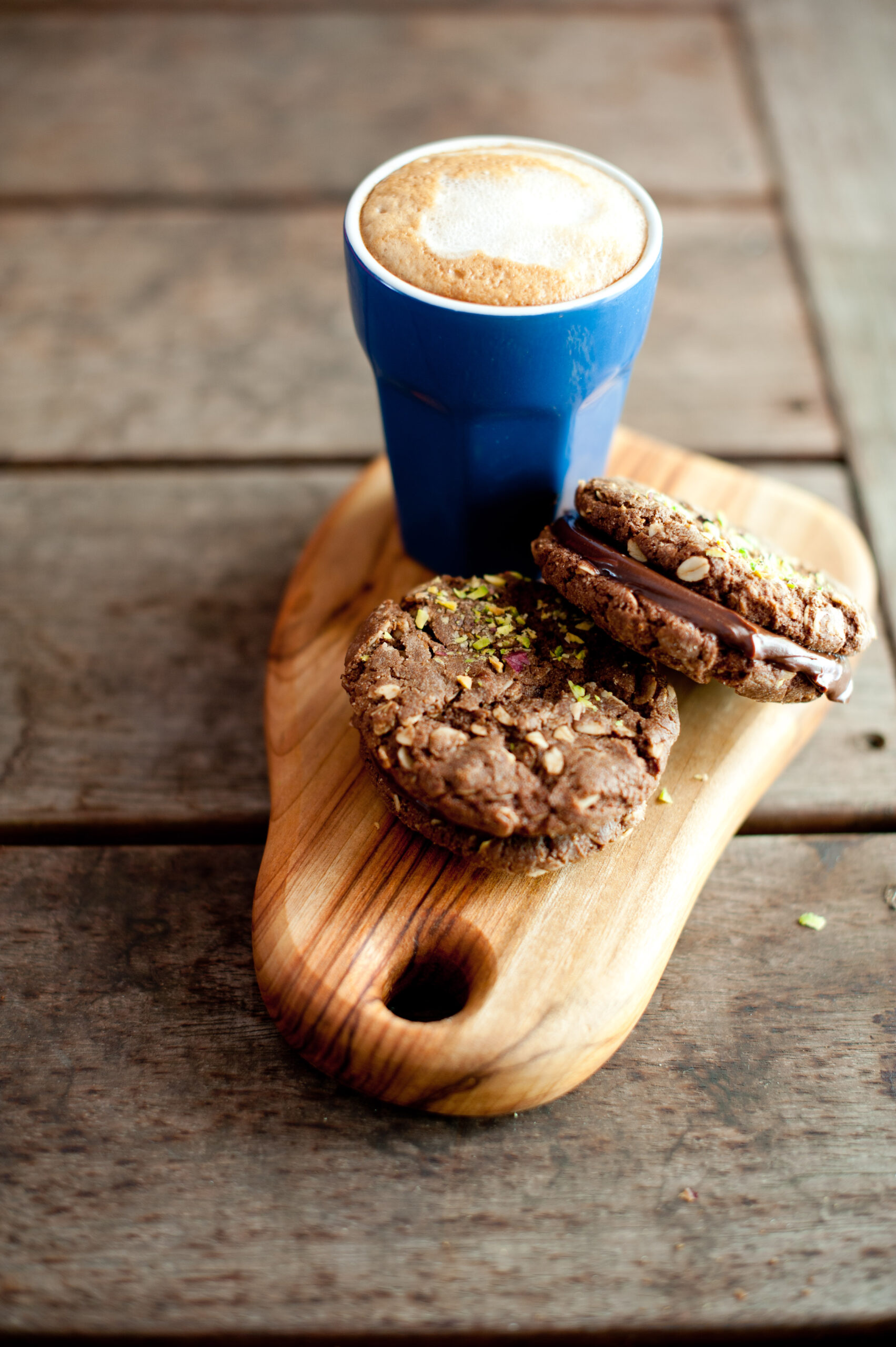 chocolate ganache filled cocoa anzac biscuit