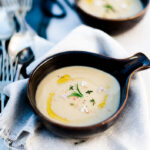 Velevety potato, leek and cashew soup in little cermamic soup bowls
