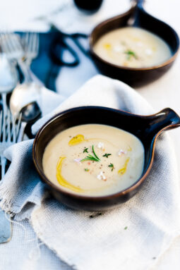 Velevety potato, leek and cashew soup in little cermamic soup bowls
