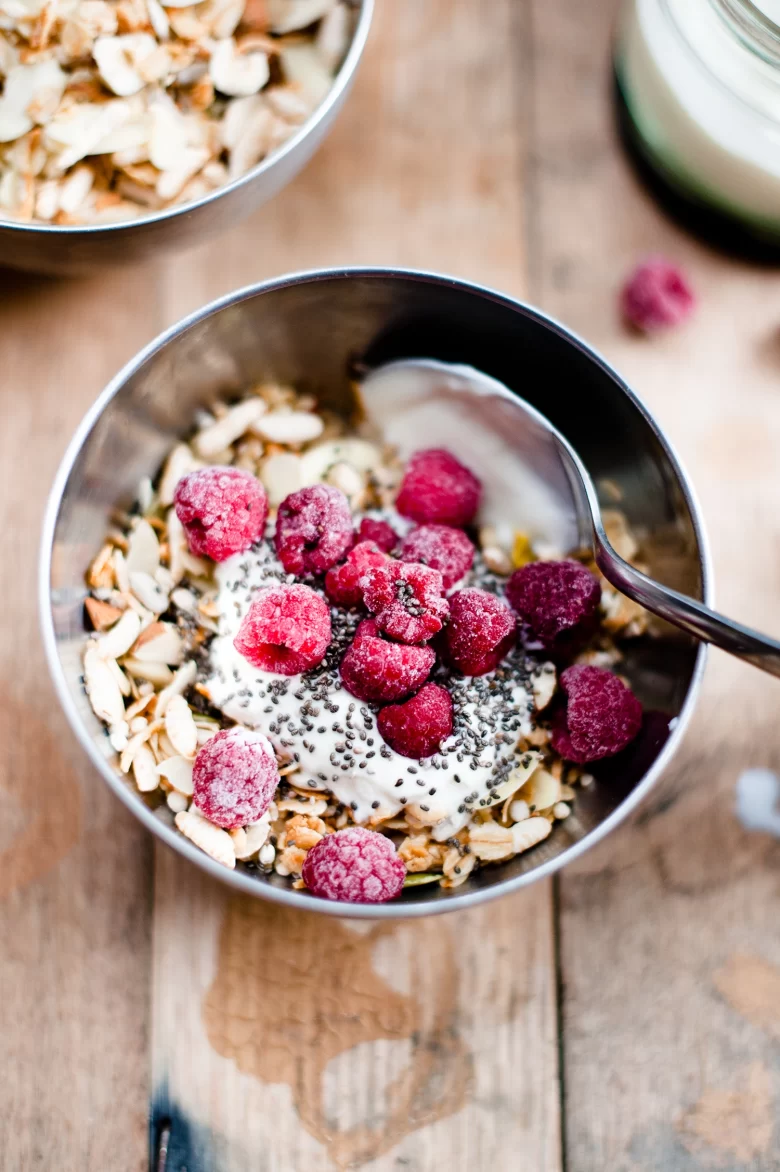 A simple Toasted Museli with raspberries and yoghurt.
