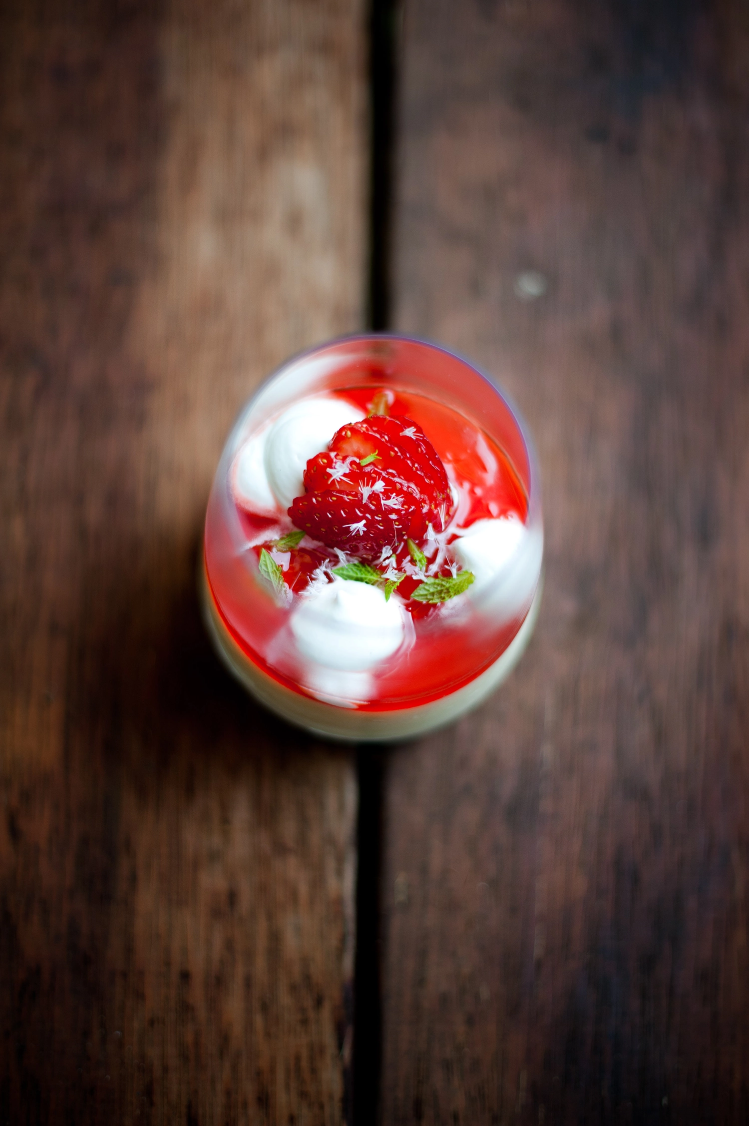 Elegant vanilla pannacotta with rosé gelée, strawberry anise syrup, lavender tuile and toasted lemon marshmallow. A stunning make-ahead dessert perfect for entertaining.