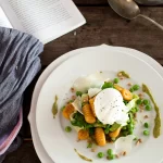 Easy gluten-free sweet potato gnocchi with veggies, pine nuts, and poached egg