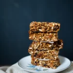 stack of Lime and Cinnamon Muesli Bars. Gluten free, Nut free, Refined sugar free. Kid Friendly.
