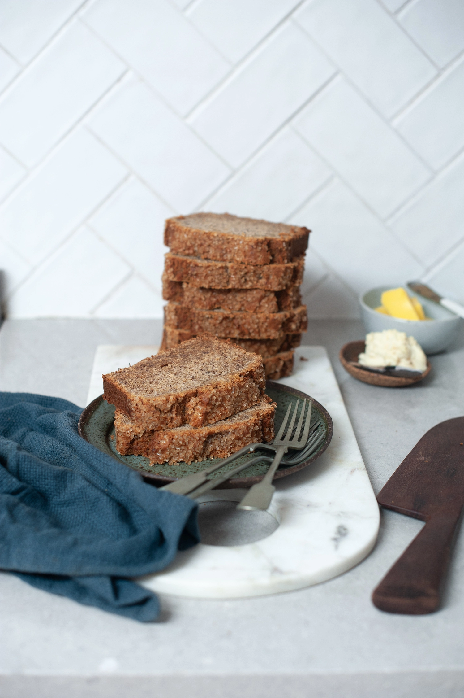 Moist gluten free café-style banana bread made with ripe bananas and simple ingredients. Perfect for toasting, freezing and everyday baking.