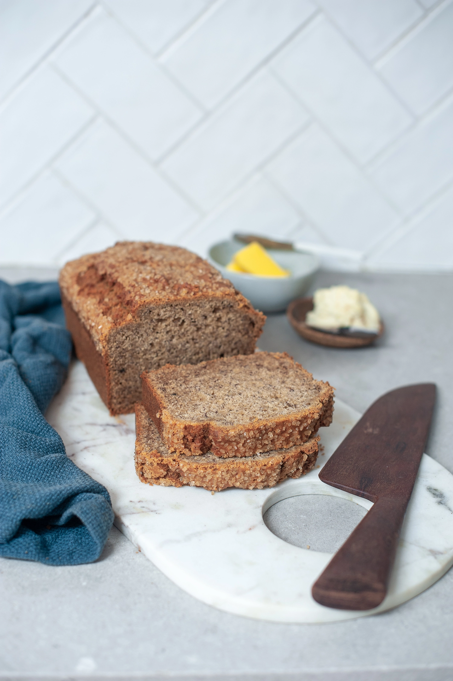 Moist gluten free café-style banana bread made with ripe bananas and simple ingredients. Perfect for toasting, freezing and everyday baking.