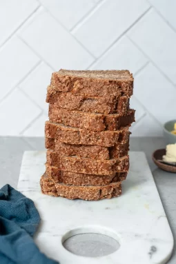 Moist gluten free café-style banana bread made with ripe bananas and simple ingredients. Perfect for toasting, freezing and everyday baking.