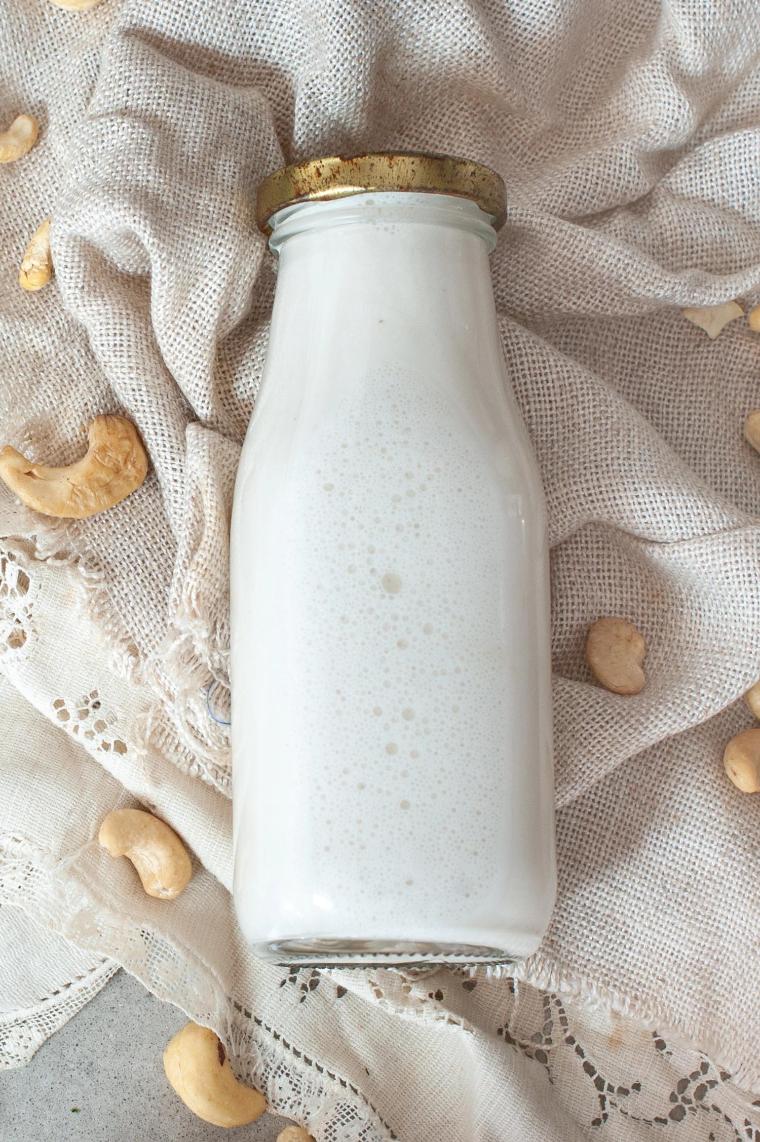 Learn how to make creamy homemade cashew milk in 5 minutes. No straining required. A simple dairy-free milk recipe perfect for coffee, cereal and smoothies.